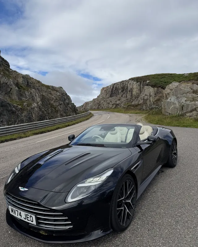 Aston Martin DB11 Volante on a mountain road