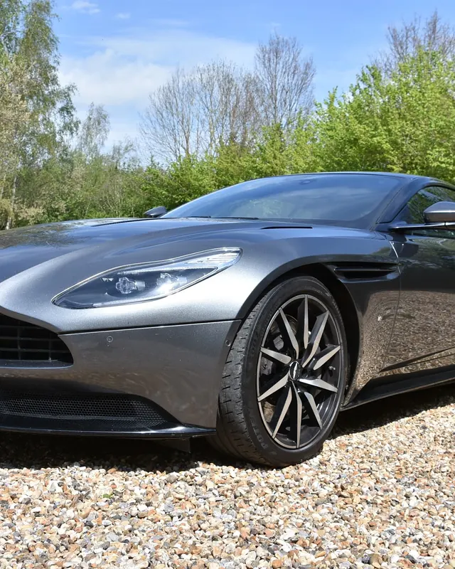 Aston Martin DB11 on a gravel drive, a 50th birthday surprise