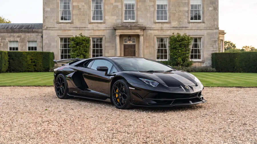 Lamborghini Aventador SVJ on the gravel drive of an English country house