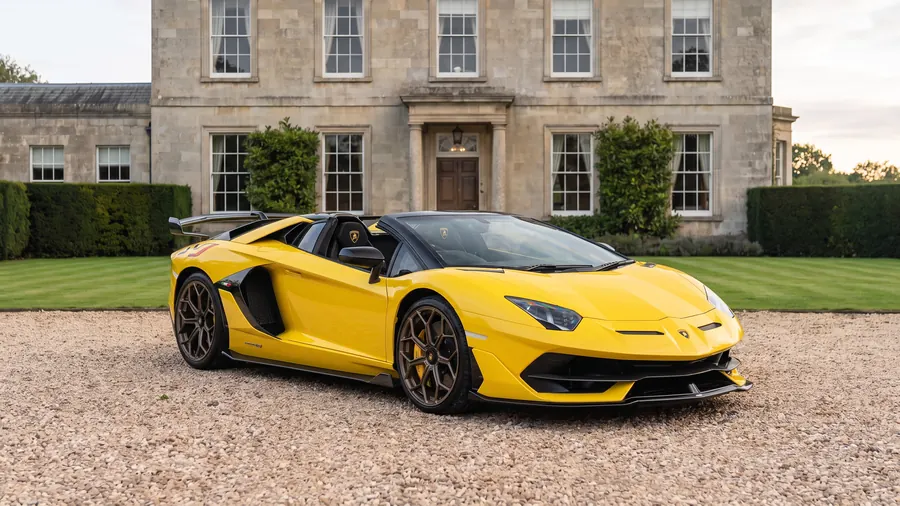 Lamborghini Aventador SVJ Roadster on the gravel drive of an English country house