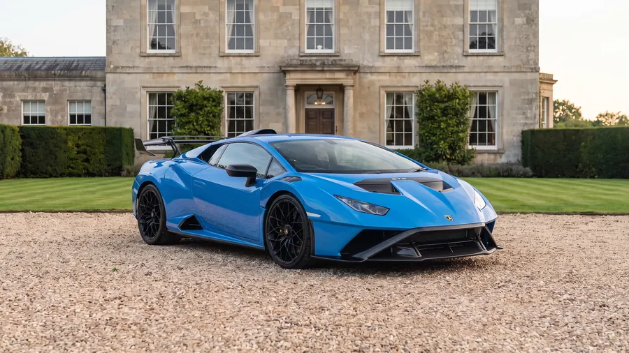 Lamborghini Huracán STO on the gravel drive of an English country house