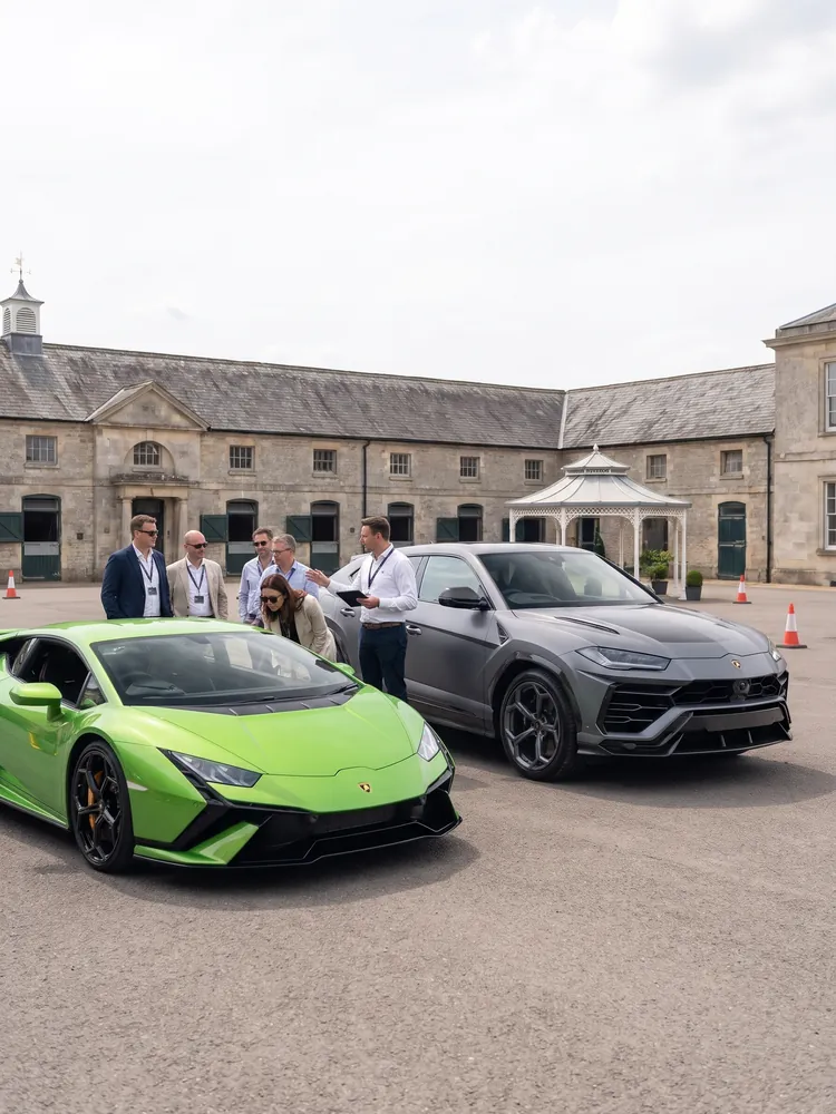 A Lamborghini Huracán Tecnica and Urus Performante at a corporate driving day