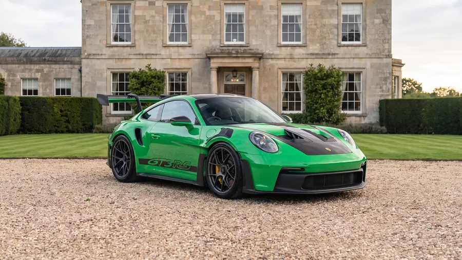 Porsche 911 GT3 RS on the gravel drive of an English country house